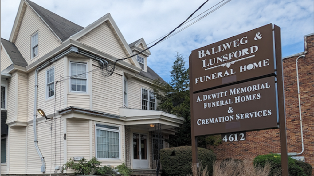 A Dewitt Memorial Funeral Homes & Cremation Services building in Syracuse, New York
